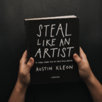 steal-like-an-artist-book-by-austin-kleon in hand